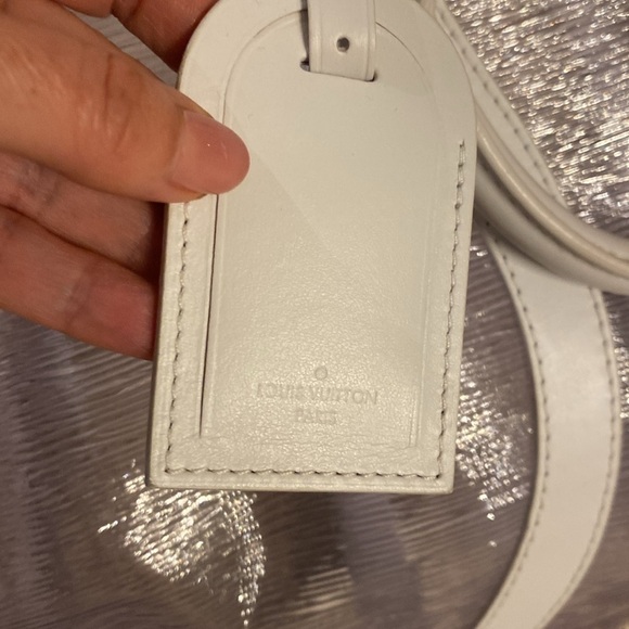 Louis Vuitton
PVC Epi Plage Wavy Keepall Bandouliére Shoulder Bag - Picture 10 of 13